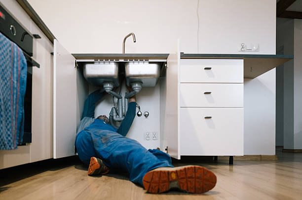 Professional Emergency Plumber technician working in Laurel, MT